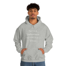 Load image into Gallery viewer, Never Underestmate the Power of a Woman Unisex Heavy Blend™ Hooded Sweatshirt