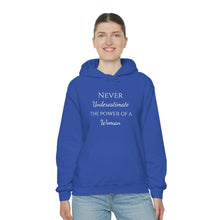 Load image into Gallery viewer, Never Underestmate the Power of a Woman Unisex Heavy Blend™ Hooded Sweatshirt