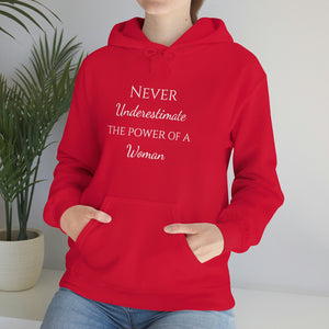 Never Underestmate the Power of a Woman Unisex Heavy Blend™ Hooded Sweatshirt