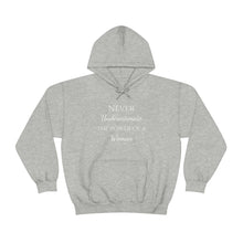 Load image into Gallery viewer, Never Underestmate the Power of a Woman Unisex Heavy Blend™ Hooded Sweatshirt