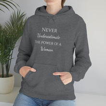 Load image into Gallery viewer, Never Underestmate the Power of a Woman Unisex Heavy Blend™ Hooded Sweatshirt