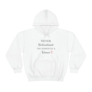 Never Underestmate the Power of a Woman Unisex Heavy Blend™ Hooded Sweatshirt