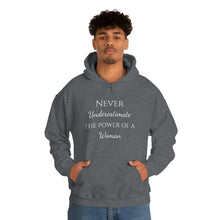 Load image into Gallery viewer, Never Underestmate the Power of a Woman Unisex Heavy Blend™ Hooded Sweatshirt