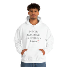 Load image into Gallery viewer, Never Underestmate the Power of a Woman Unisex Heavy Blend™ Hooded Sweatshirt