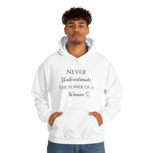 Never Underestmate the Power of a Woman Unisex Heavy Blend™ Hooded Sweatshirt