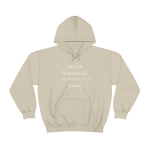 Never Underestmate the Power of a Woman Unisex Heavy Blend™ Hooded Sweatshirt