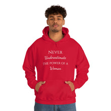 Load image into Gallery viewer, Never Underestmate the Power of a Woman Unisex Heavy Blend™ Hooded Sweatshirt