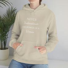 Load image into Gallery viewer, Never Underestmate the Power of a Woman Unisex Heavy Blend™ Hooded Sweatshirt