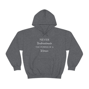 Never Underestmate the Power of a Woman Unisex Heavy Blend™ Hooded Sweatshirt