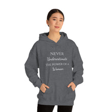 Load image into Gallery viewer, Never Underestmate the Power of a Woman Unisex Heavy Blend™ Hooded Sweatshirt