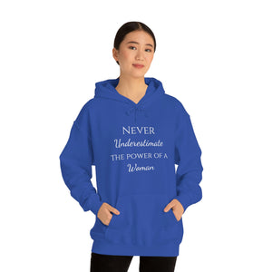 Never Underestmate the Power of a Woman Unisex Heavy Blend™ Hooded Sweatshirt