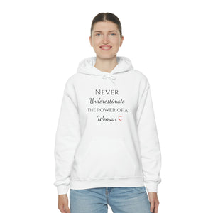 Never Underestmate the Power of a Woman Unisex Heavy Blend™ Hooded Sweatshirt