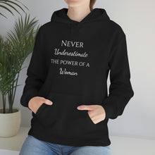 Load image into Gallery viewer, Never Underestmate the Power of a Woman Unisex Heavy Blend™ Hooded Sweatshirt