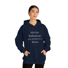 Load image into Gallery viewer, Never Underestmate the Power of a Woman Unisex Heavy Blend™ Hooded Sweatshirt