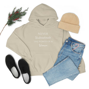 Never Underestmate the Power of a Woman Unisex Heavy Blend™ Hooded Sweatshirt