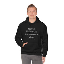 Load image into Gallery viewer, Never Underestmate the Power of a Woman Unisex Heavy Blend™ Hooded Sweatshirt