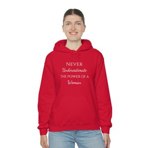 Never Underestmate the Power of a Woman Unisex Heavy Blend™ Hooded Sweatshirt