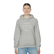 Load image into Gallery viewer, Never Underestmate the Power of a Woman Unisex Heavy Blend™ Hooded Sweatshirt